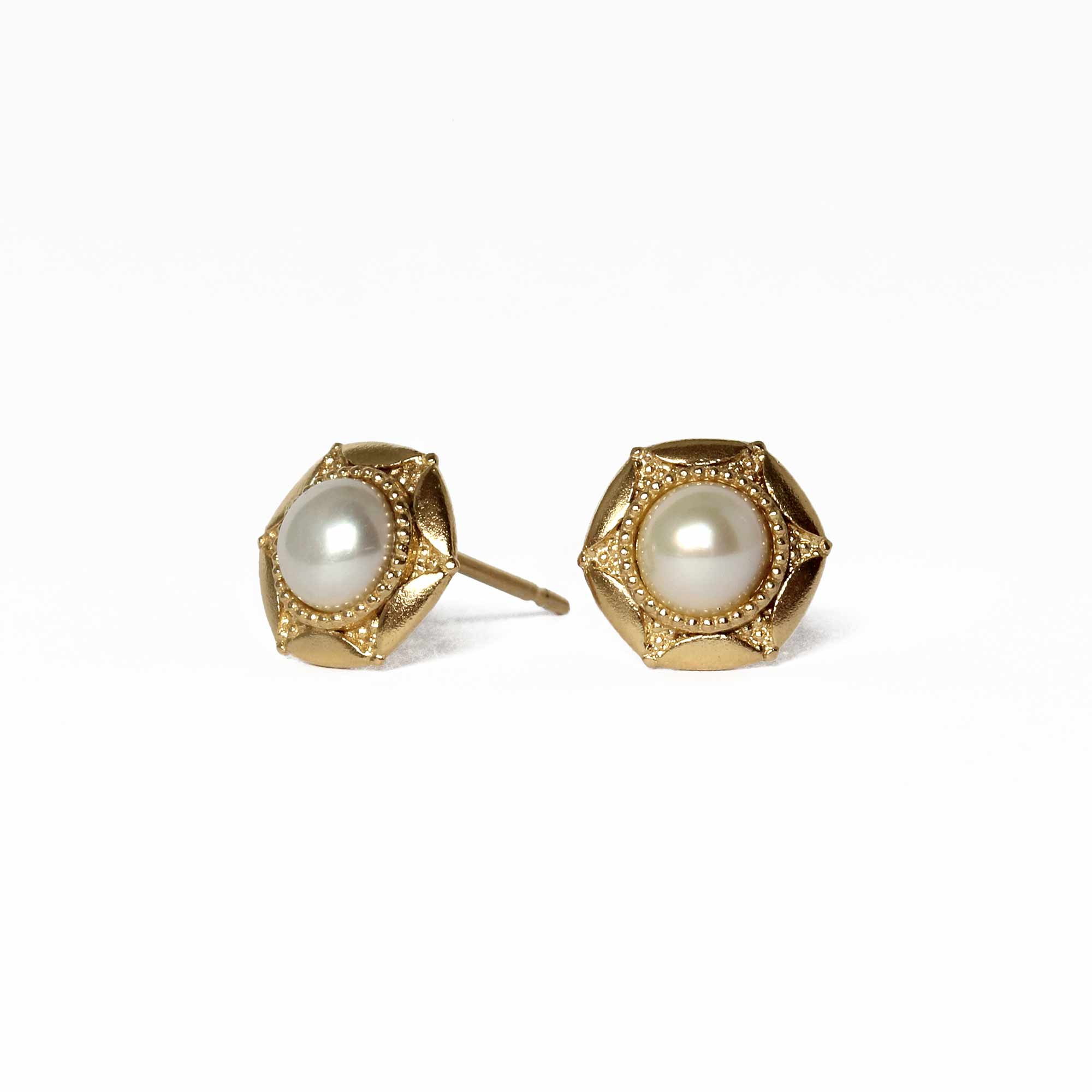 Statement textured gold pearl earrings, inspired by the moon. product shot on white background