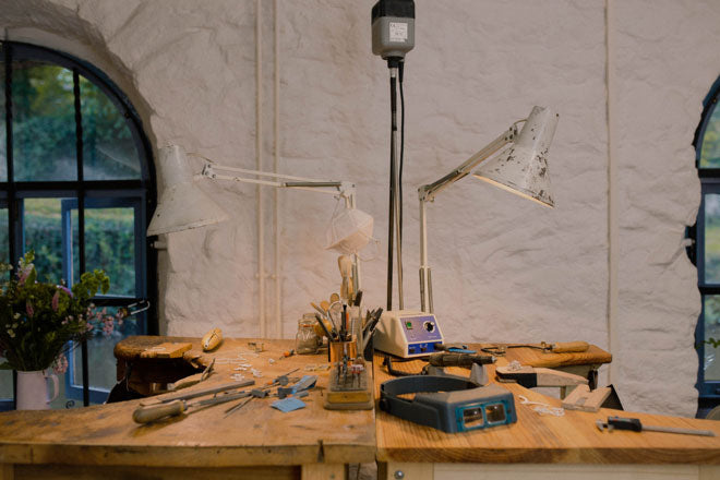 Jewellery making tools on workbenches at Rosie Kent's studio near Manchester