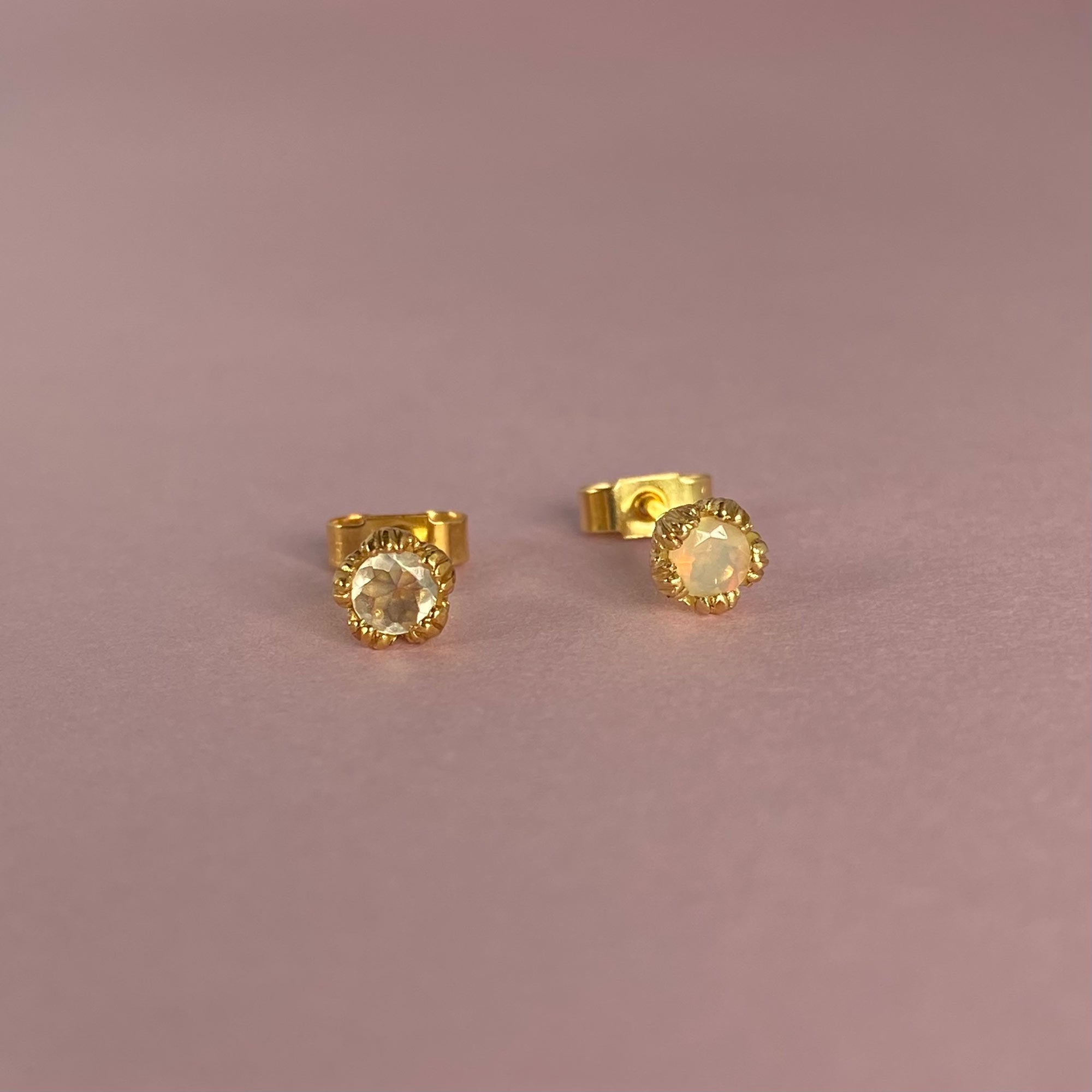 Faceted opal gold earrings