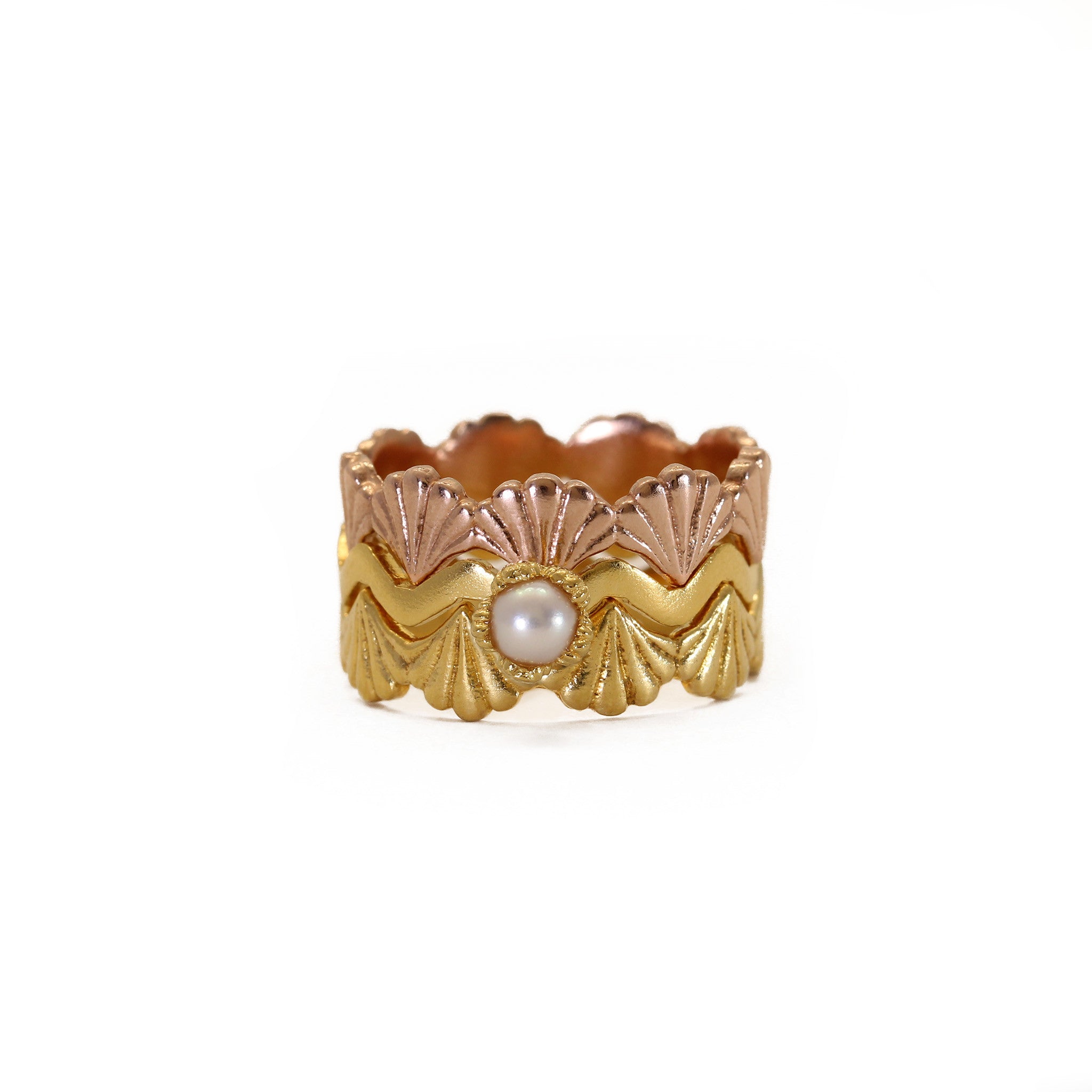 Yellow gold and rose gold stacking rings in column