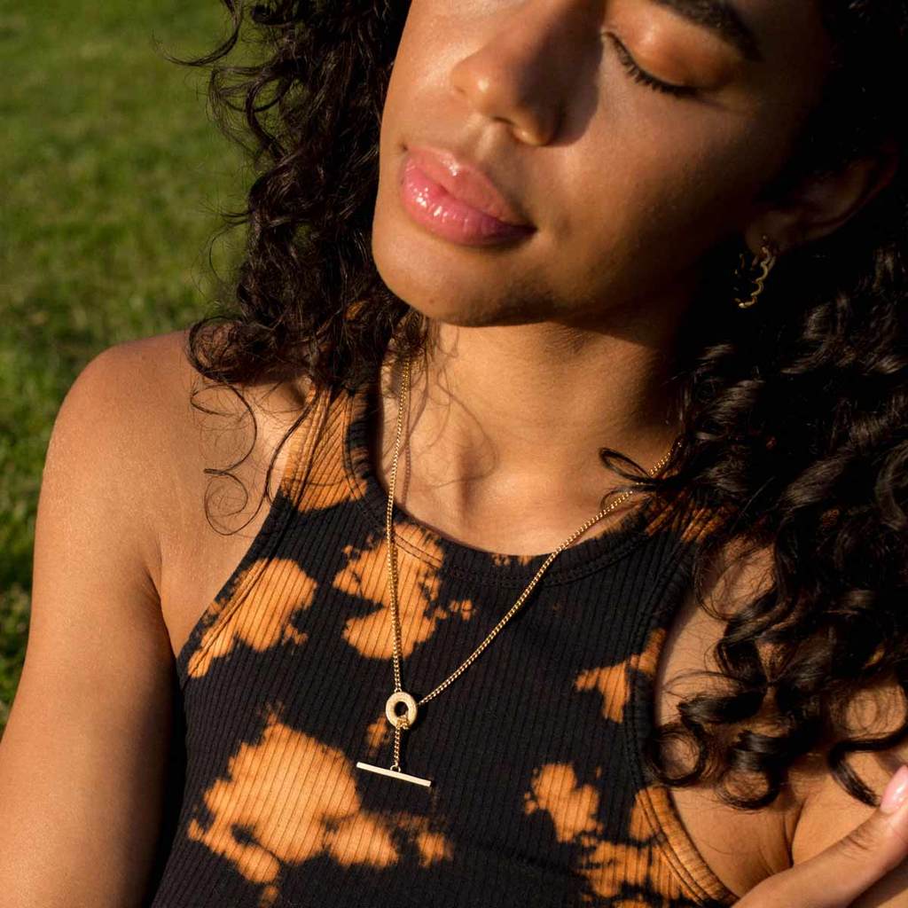 Gold chunky t bar necklace worm my model in evening sun